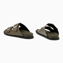 Mules plates Célia kaki verni à boucles oversize