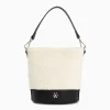 Sac seau Milou ivoire et noir en faux shearling